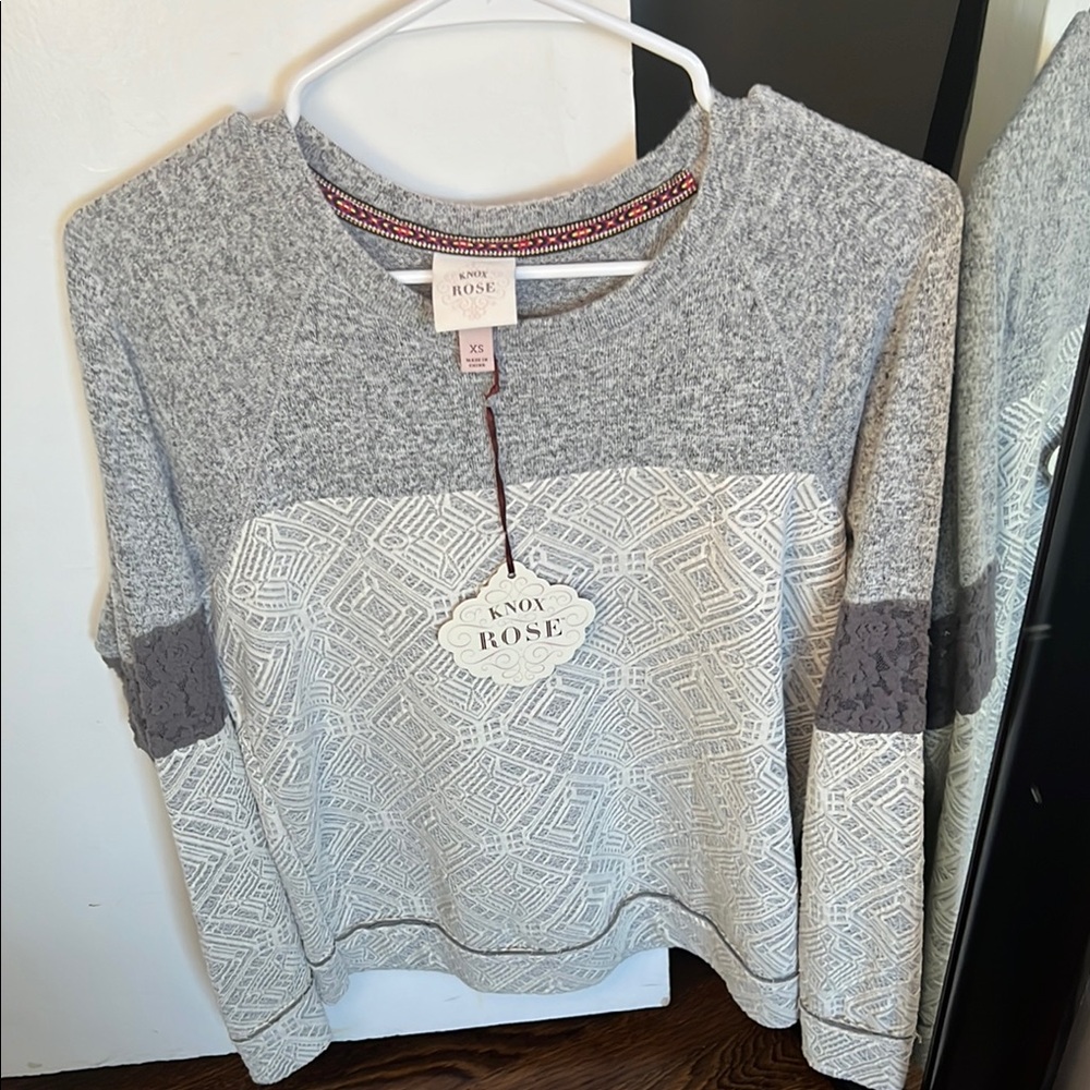 New with tags: Lightweight, casual sweater with lace and detailing